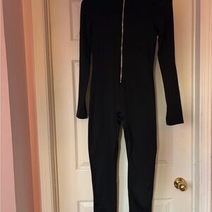 Black Long Sleeve Jumpsuit with Zipper. No brand. No tag.